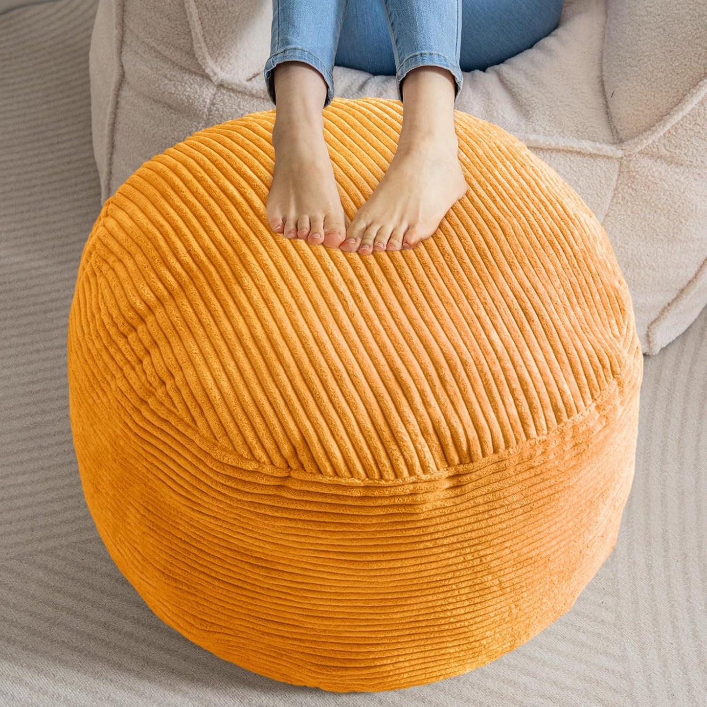 HIGOGOGO Round Stuffed Pouf Ottoman, Corduroy Poufs with Foam Chunk Filling, Furry and Fluffy Pouf Foot Stool Storage Ottoman, 26 X 18 Floor Poufs Foot Rest for Living Room, Orange